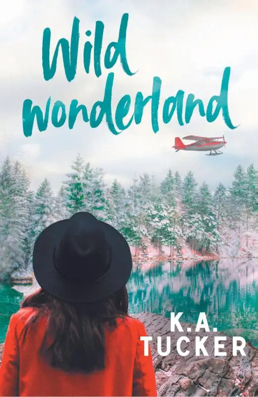 De boekcover van wild wonderland door k.a. tucker toont een avontuurlijk ontwerp voor liefhebbers van romantische thrillers