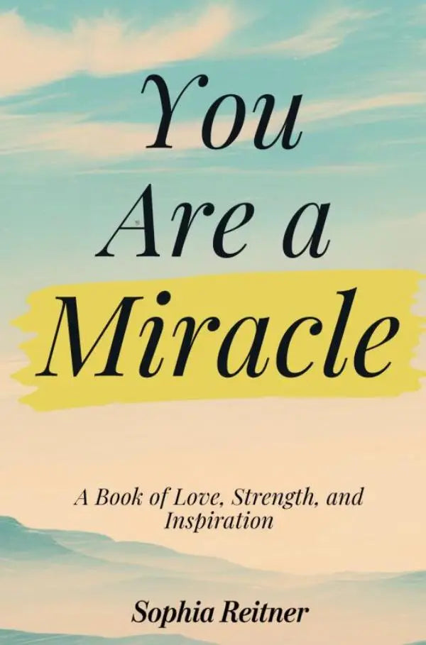 A boek getiteld you are a miracle met een zachte pastelkleurige lucht en bergachtergrond voor inspiratie