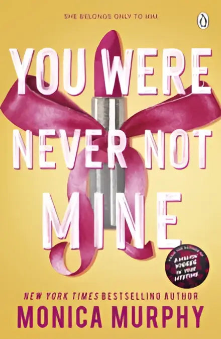 Een zilveren lippenstift met een levendige roze strik op de omslag van you were never not mine van monica murphy lancaster prep makes her